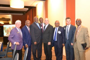 Miami Mayor Carlos Gimenez, Miami Commissioner Dennis C. Moss and Foundation for Democracy in Africa CEO Fred Oladeinde pose at the US - Africa Trade & Investment Conference, AfrICANDO 2018
